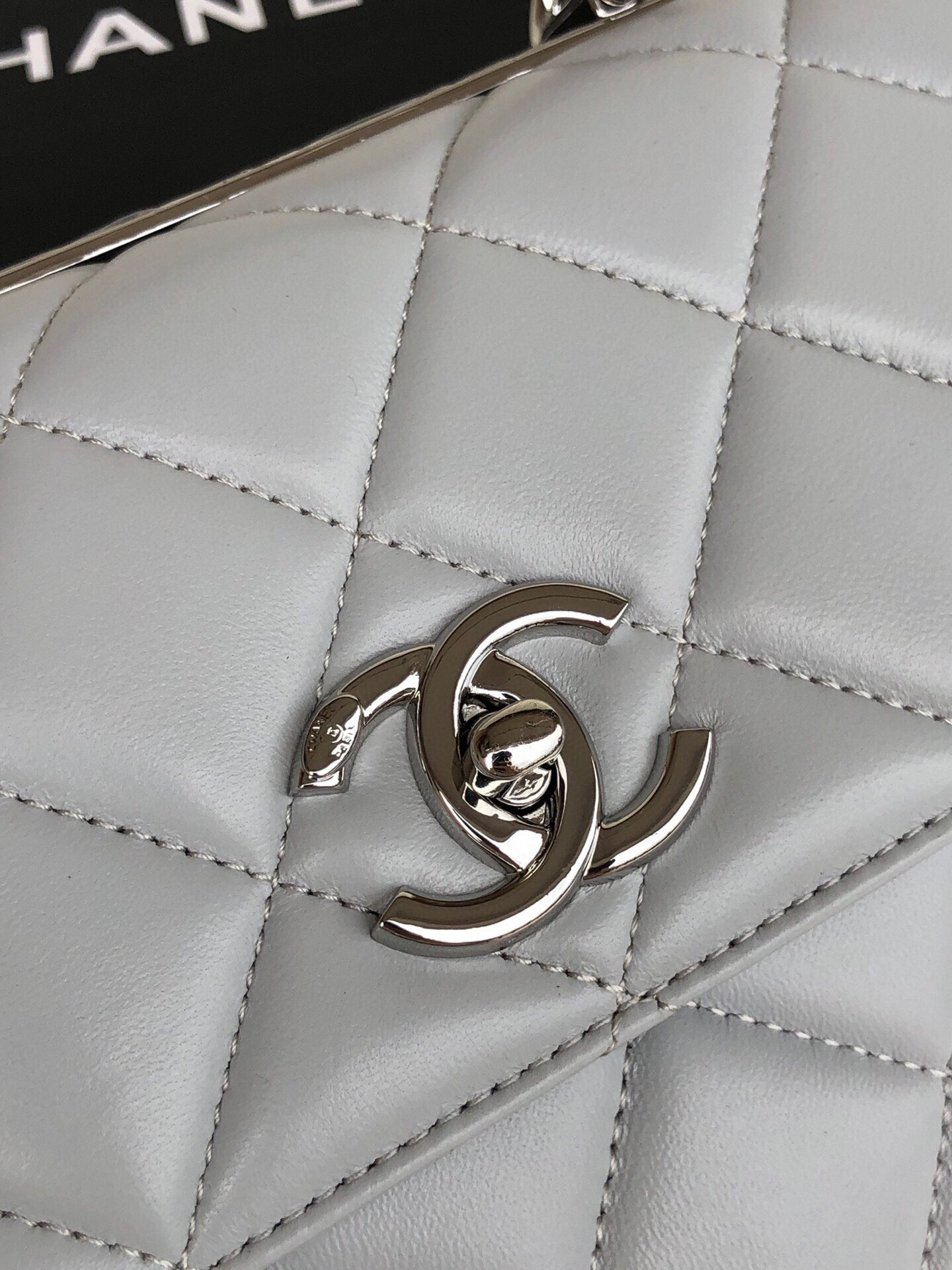 Ch**el FLAP BAG WITH TOP HANDLE 6.6 × 9.8 × 4.7 in