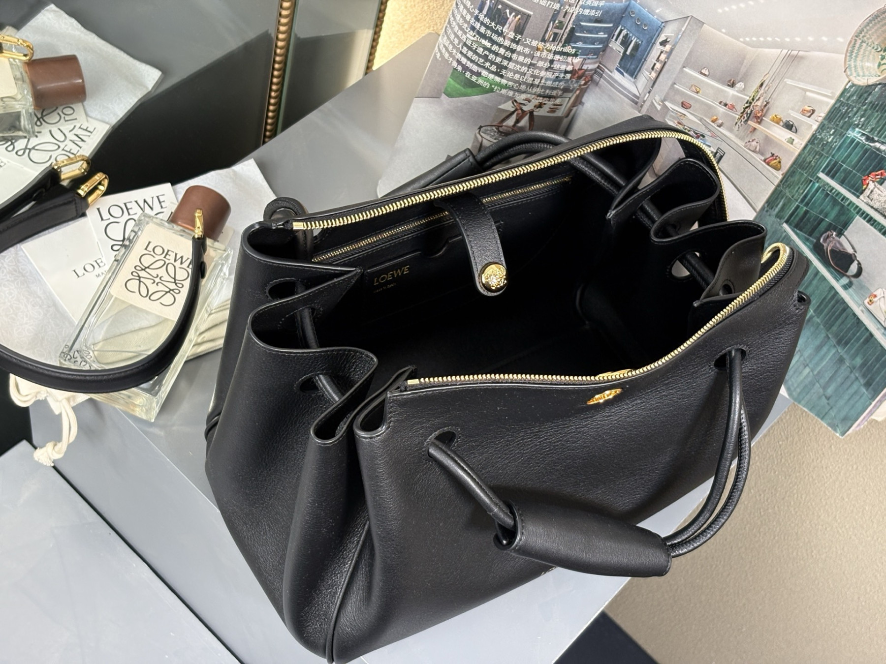 L0ew* Medium Madrid bag in S*pple calfskin 28.5x11x23cm