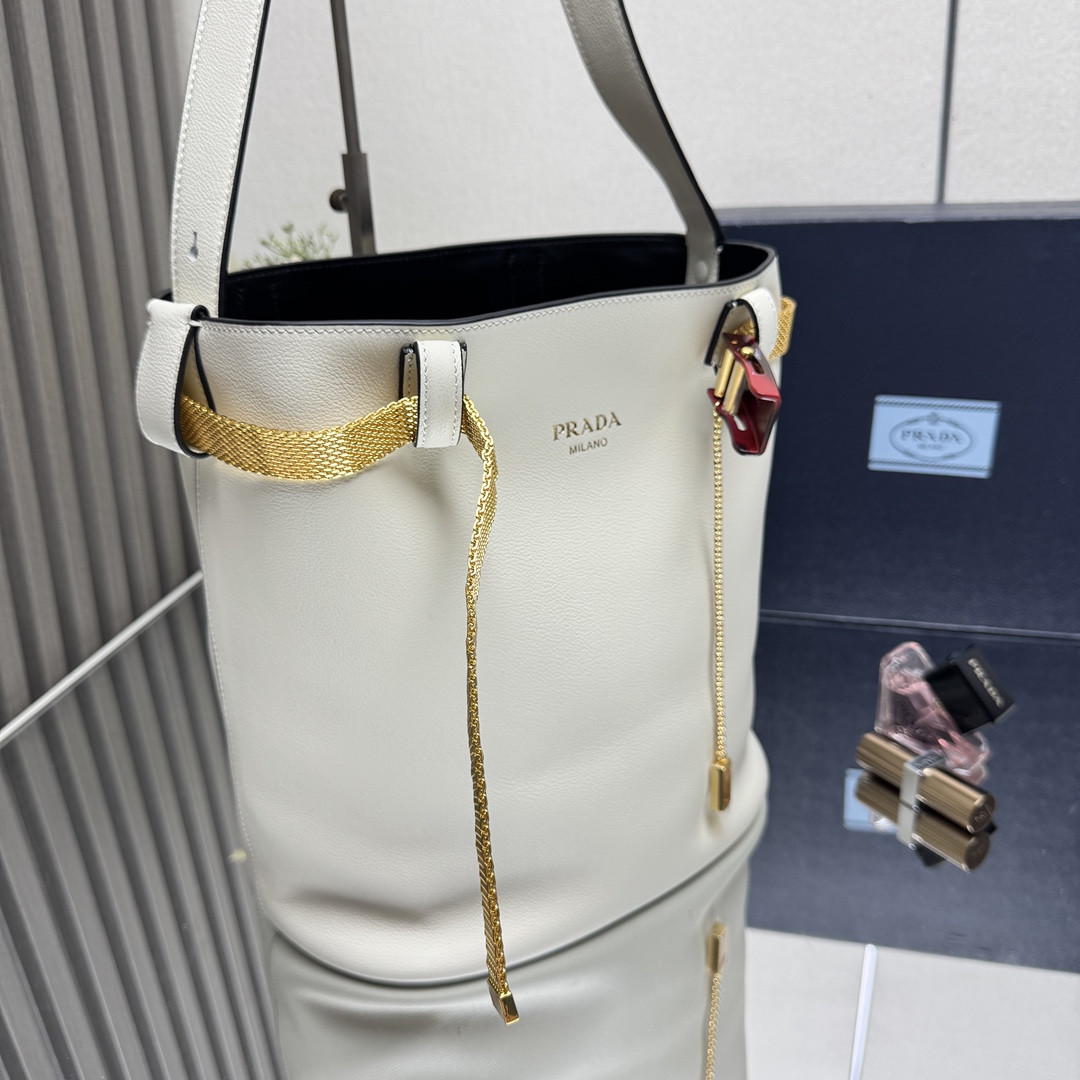 Pra*a Buckle leather bucket bag with jeweled belt 29x26.5x18cm